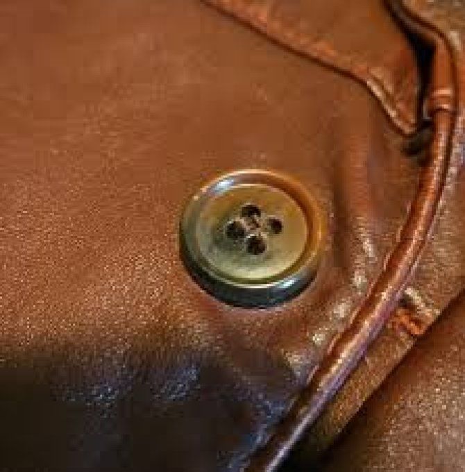 Changement de boutons sur vestes ou manteau