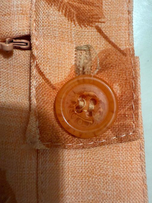 changement rajout de boutons sur robes/jupes